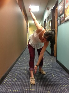 Lindsay is shown here shifting into her hips and rotating her thorax as she takes deep breaths to encourage thoracic mobility and rotation.
