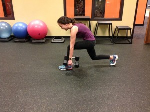  In this picture lauren is reaching her shoes, decreasing back muscle activation and facilitating glute activation.
