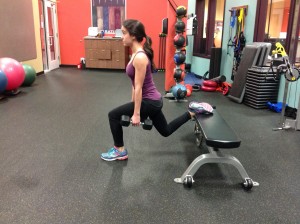 This squat is wrong - Lauren's back is arched